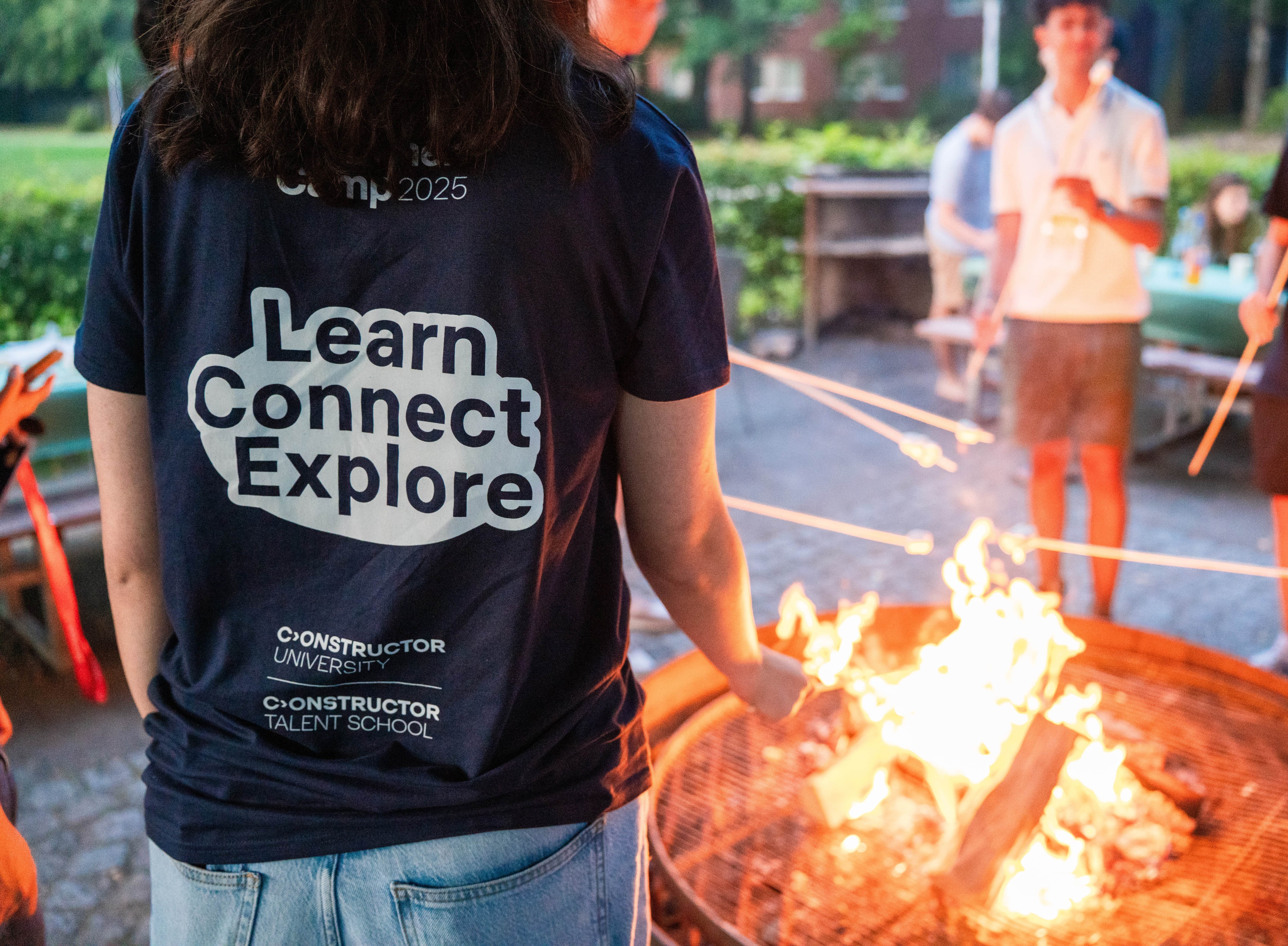 Constructor Summer Camp Students at bonfire.