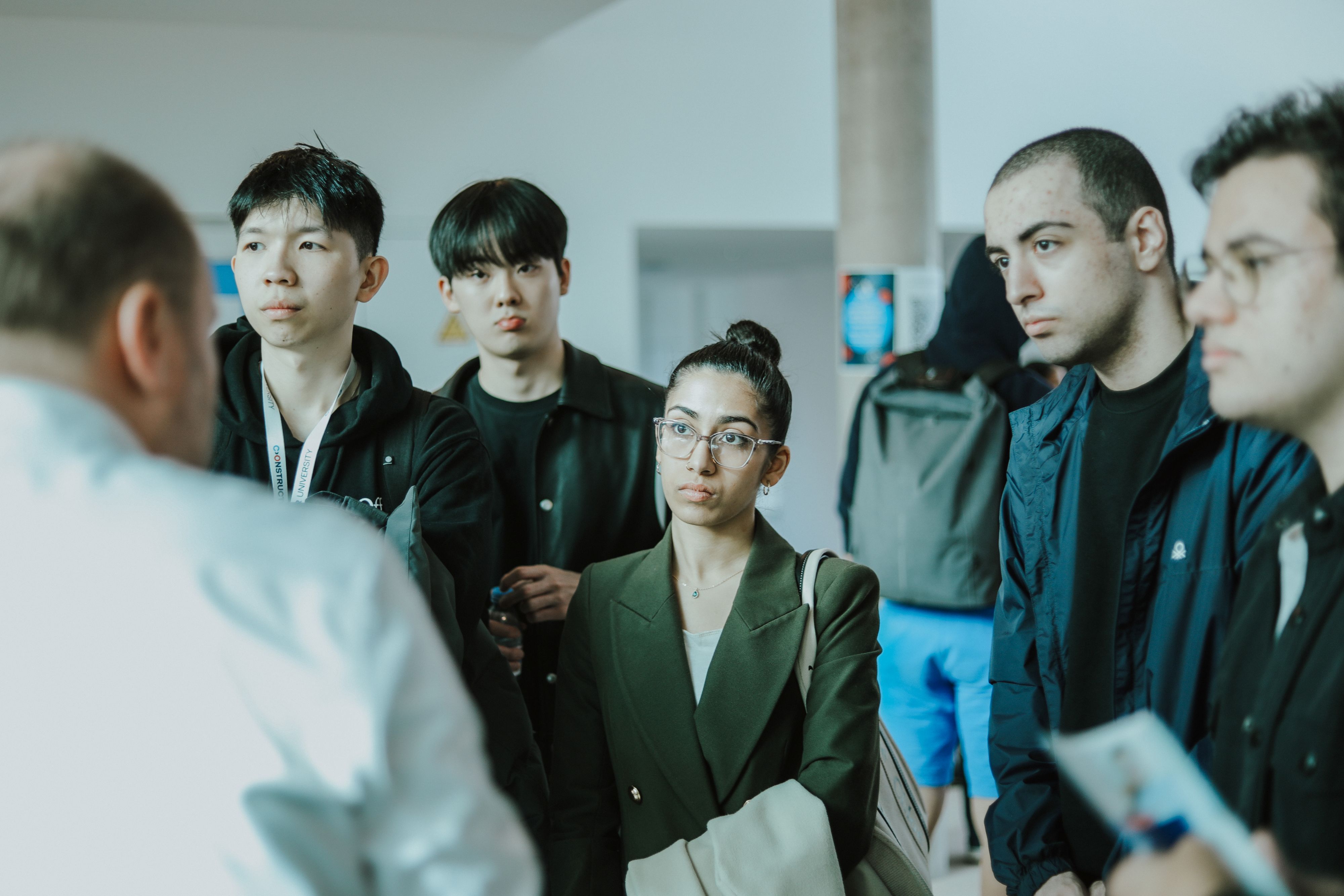 group of constructor university students at career fair.