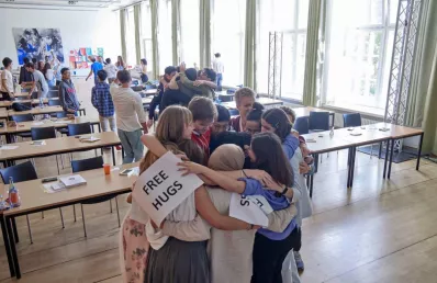 Students hugging each other