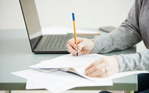 a picture of a person writing 