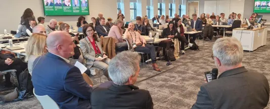 Dr. Mariia Snigireva, Executive Director of Constructor Knowledge Labs, moderates a panel discussion related to RAISE at AIS26 in Dublin.