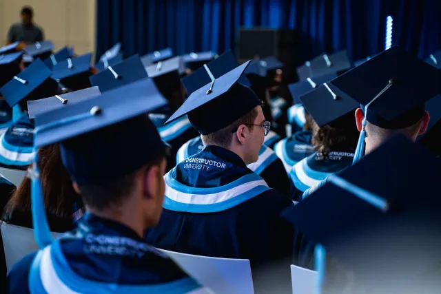 Students with their caps at Graduation ceremony